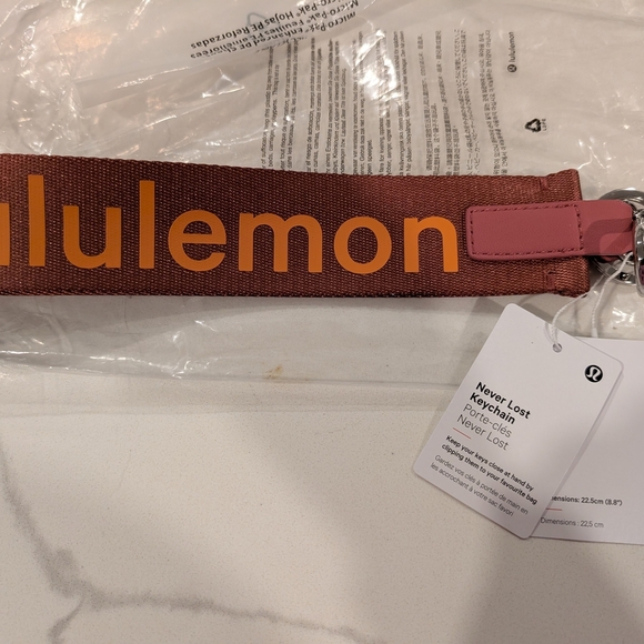lululemon athletica Accessories - Lululemon Pink and Brown Keychain